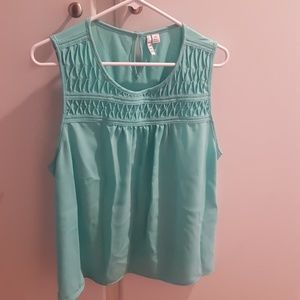 Elle Green teal sleeveless top.